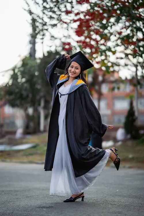 Kushum celebrating graduation